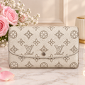 Louis Vuitton Mahina Iris Portefeuille Perforated Leather Ivory Continental Wallet